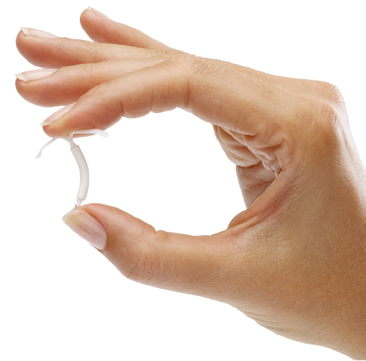 Hånd med hormonspiral Hånd holder hormonspiral mellem to fingre og viser, at den er fleksibel og bøjelig